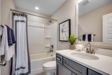 Full bathroom with tile patterned floors, shower /
