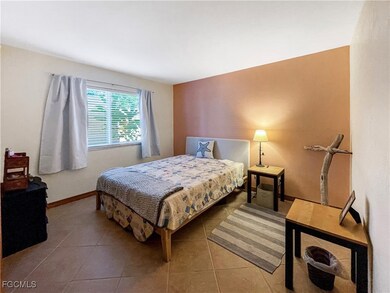 Bedroom featuring tile patterned flooring