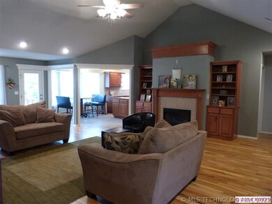 Gorgeous hardwood floors and dramatic ceiling trea