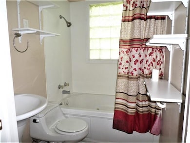Bathroom - Features over sized jetted tub/shower i