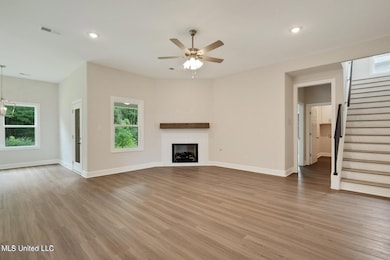 Photo is of a similar home,