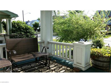 Lovely front porch to sit and watch the world go by, work in your yard and chat with neighbors!