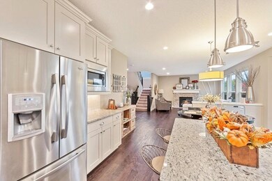 Open great room plan.  This home has large windows