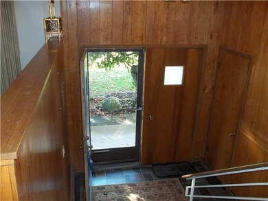 Foyer. Looking down the stairs toward the front do