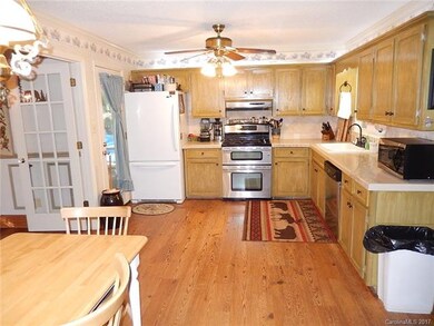 KITCHEN WITH GRANITE & TILE BACKSPLASH