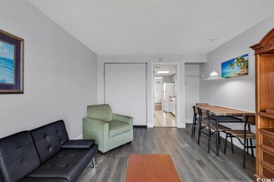 Living room featuring tile patterned floors