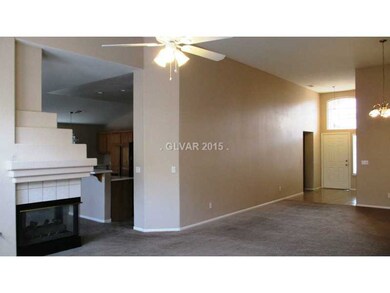 Dining Room. with ceiling fan and dual fire place.