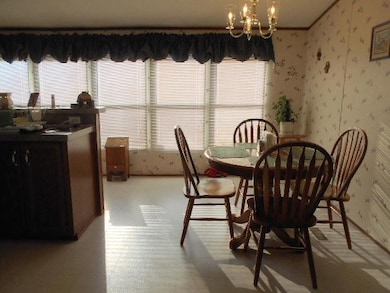 Dining area and island In the kitchen are the perfect hangout!