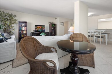Living room with light tile patterned floors