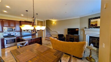 Kitchen with tasteful backsplash, a kitchen island