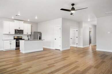 Connected kitchen and living space offers the perf