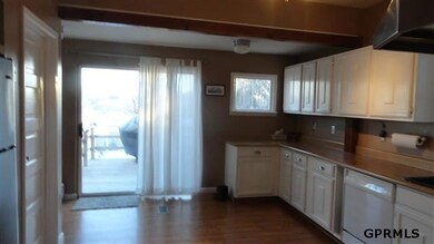 huge kitchen with stainless steel appliances