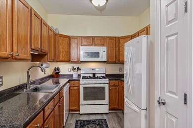Spicket Commons unit 108, Methuen, MA 01844 - photo 6