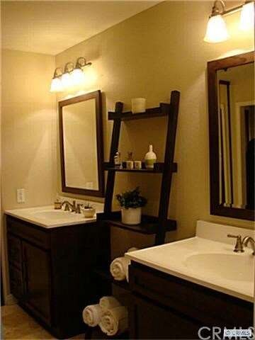 Master bath with mirrored wardrobe.