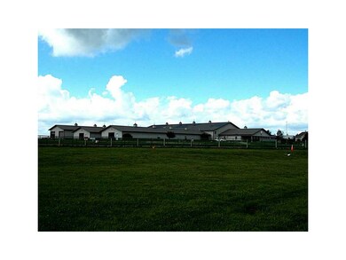 . 41.11 acres with a number of round pens, indoor 