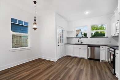 Find an additional nook alongside the kitchen with