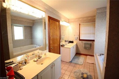 master bath with jacuzzi tube, double vanities, wa