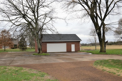 Detached Garage. Floored upstairs