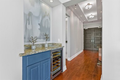A powder room can be found to right of the front e