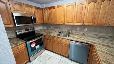 Fifty Fifty Condominiums unit 101, Miami, FL 33126 - photo 2