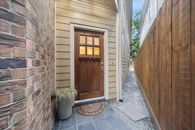 Beyond the pedestrian gate is a welcoming courtyar