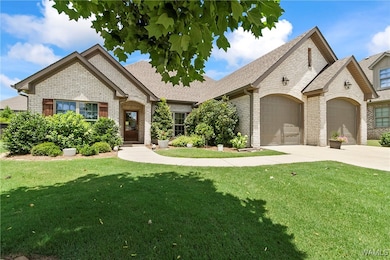 This home has gutters and outdoor lighting.  Wood