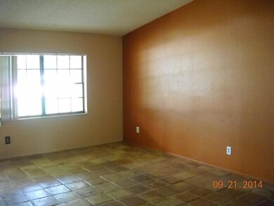 Living room view with a Vaulted Ceiling