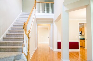 The bright, open foyer provides a warm welcome int