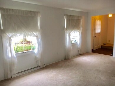 LIVING ROOM - HARDWOOD FLOORS UNDER ALL THE CARPET