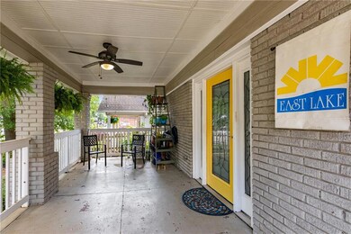 The front porch is large and welcoming, perfect fo