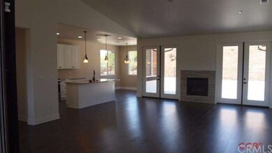 The great room view of kitchen and breakfast nook.