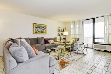 Large living room with door to balcony