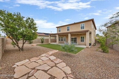 Large backyard with mature landscaping