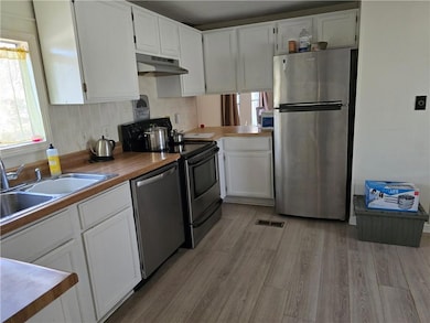 204 S Lyne Ave, Raymore, MO 64083 - photo 5