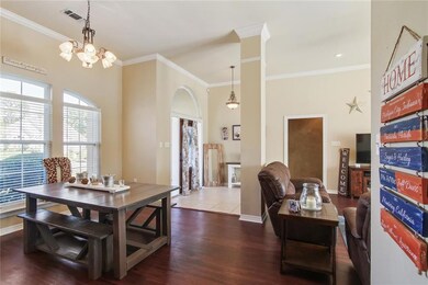 Formal dining room with beautiful arch window and