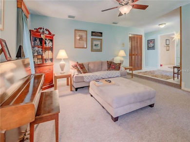 A pocket door easily separates the living room fro