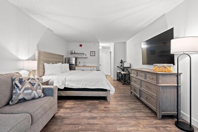 Bedroom featuring wood finished floors