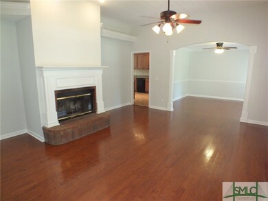 Wood burning fireplace with custom mantel, wood fl