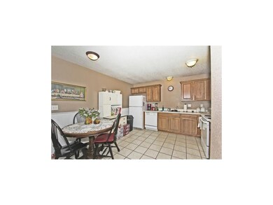 Great kitchen with tile floor & lots of cabinets.