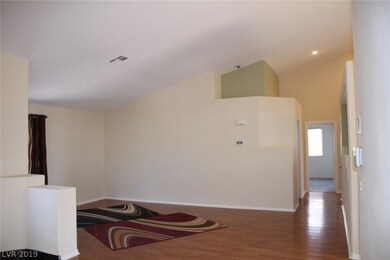 Open and dimensional with vaulted ceilings.