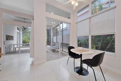 Dining room featuring ceiling fan, light tile patt