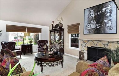 Stone Fireplace & Cathedral Ceiling in Living Room