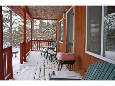 Exterior Front full length covered porch for relax