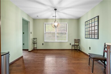 The kitchen also includes engineered hardwood.