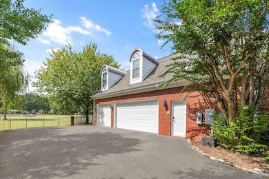 Above the garage, accessed by a walk up stairway, you will find 560 sq. ft. of unfinished space - perfect for storage or for creating additional living space.