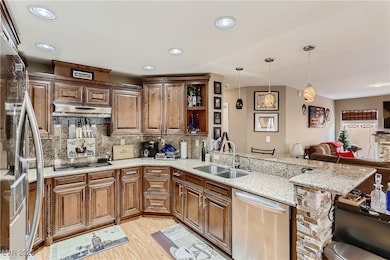 Kitchen with appliances with stainless steel finis