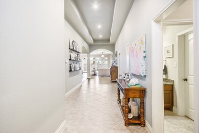 Front entry of home has high ceilings.