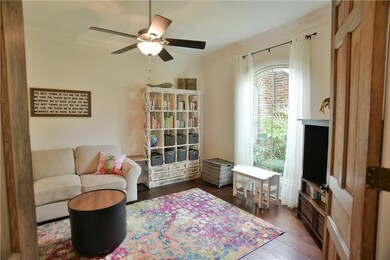 This peaceful den can double as a playroom or offi