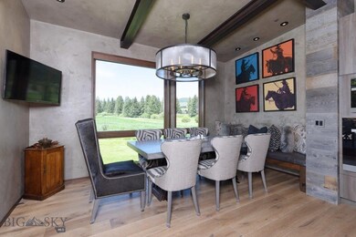 Dining room with golf course beyond.
