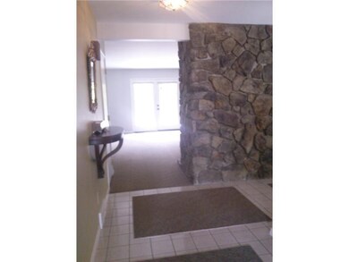 Entry/Foyer. Large, ceramic-tiled foyer